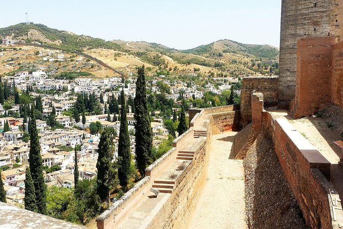 Alhambra Private Tour Hotel or Shore Pickup in Marbella or Malaga - Inside the Alhambra: from military fortress to royal palace