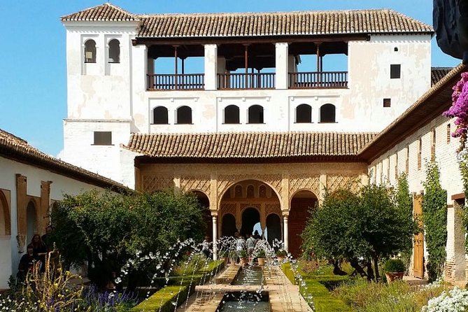 Alhambra Private Tour Hotel or Shore Pickup in Marbella or Malaga - Franciscan Parador and a church stop: Granada’s layered identity