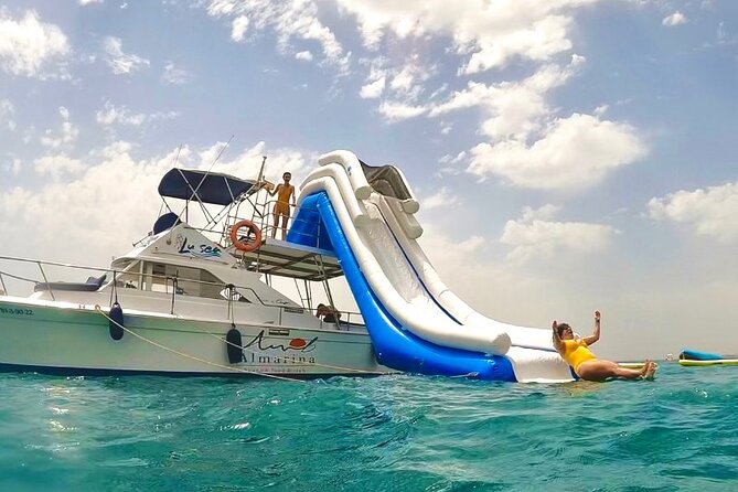 Boat Tour with Snorkeling, Water Slide, Lunch and Pick Up - Paddle surfing and kayaking: exploring at a calmer pace