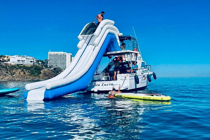 Boat Tour with Snorkeling, Water Slide, Lunch and Pick Up - The 20-foot slide: the tour’s loudest highlight