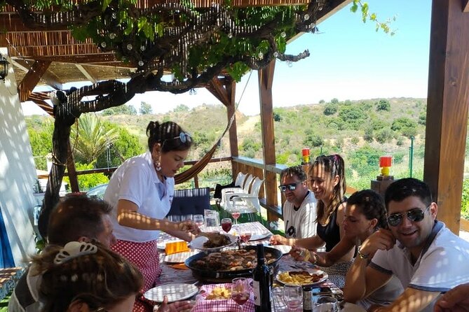 Chefcooking Paella from our Andalusian Grandmother at a Family Farm - Starters that set the stage: mussels, cheeses, olives, ham, and more
