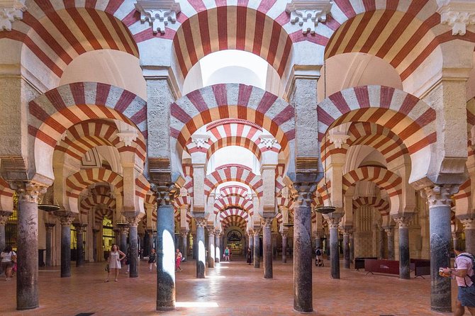Cordoba Full Day Trip with Mosque Entrance from Malaga - Guides, Group Size, and the English Experience