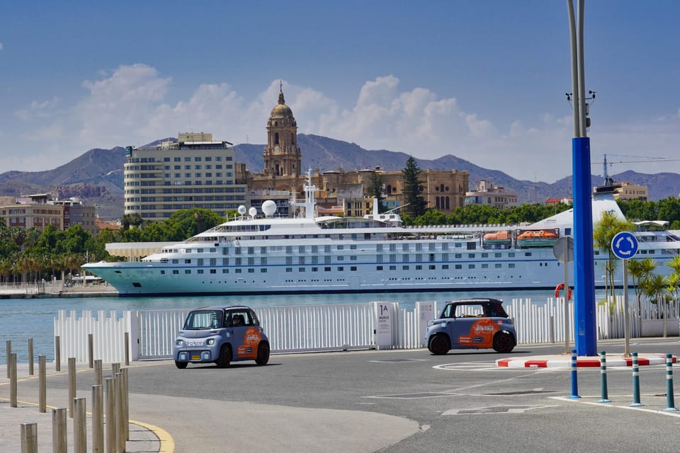 Explore Málaga and the Treasure Caves by Electric Car - Central Málaga After the Sea: Soho, Cathedral, Museum, and Banco de España