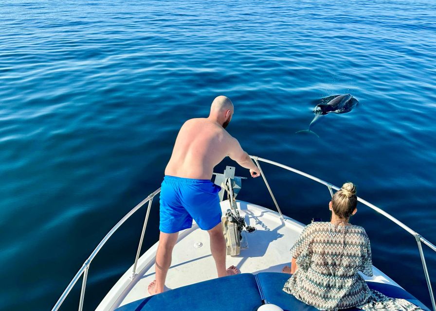 From Benalmádena & Torremolinos: Dolphin Watch Boat Trip - Comfort on board: music, water, and what’s missing