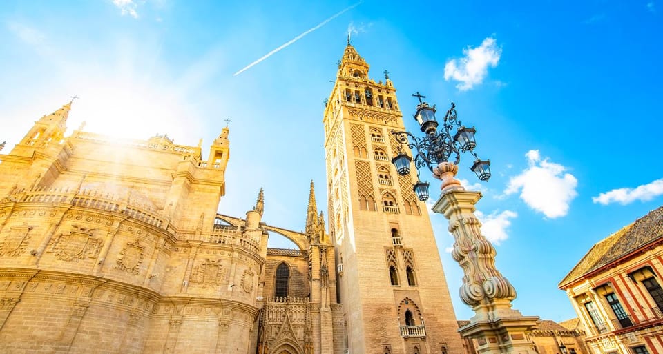 From Costa del Sol: Guided Tour of Seville - Entering Seville Cathedral: Gothic Scale and Columbus’s Sarcophagus