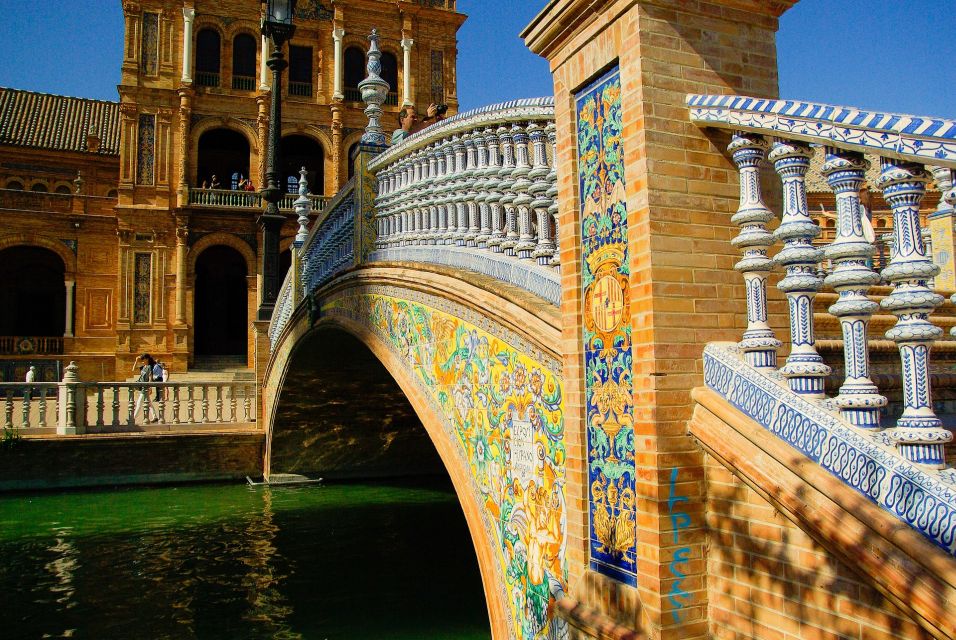 From Costa del Sol: Seville and Royal Alcázar Palace - Seville Cathedral and Giralda: the scale is real, so listen for context
