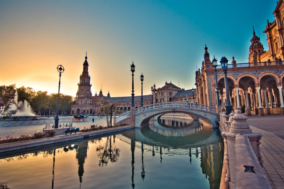 From Malaga: Private Seville, Alcazar and Cathedral Day Trip - Giralda Tower: Almohad Minaret to Seville’s Icon