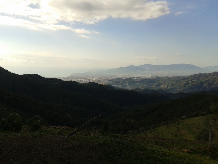 Málaga: 4-Hour Premium E-Bike Tour with Panoramic Views - The long downhill: winding roads and a coastline back to town