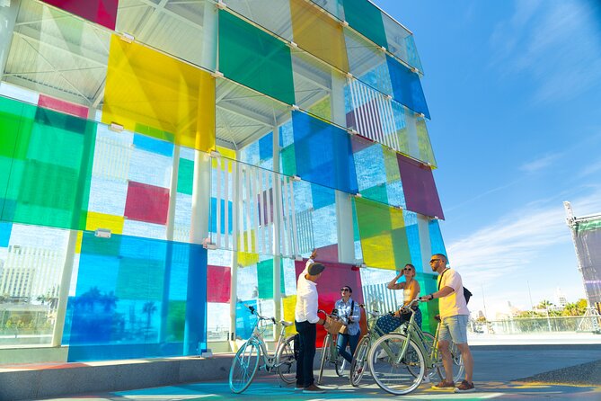 Málaga: City Highlights & Hidden Gems Guided Vintage Bike Tour - Puerto de Málaga Promenade: The Palmeral Ride and the Cube Photo Moment