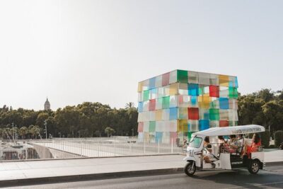 Malaga Expert Tour with Local Guide in Eco Tuk Tuk Private - Plaza de la Marina and Málaga Cathedral: the city’s center of gravity