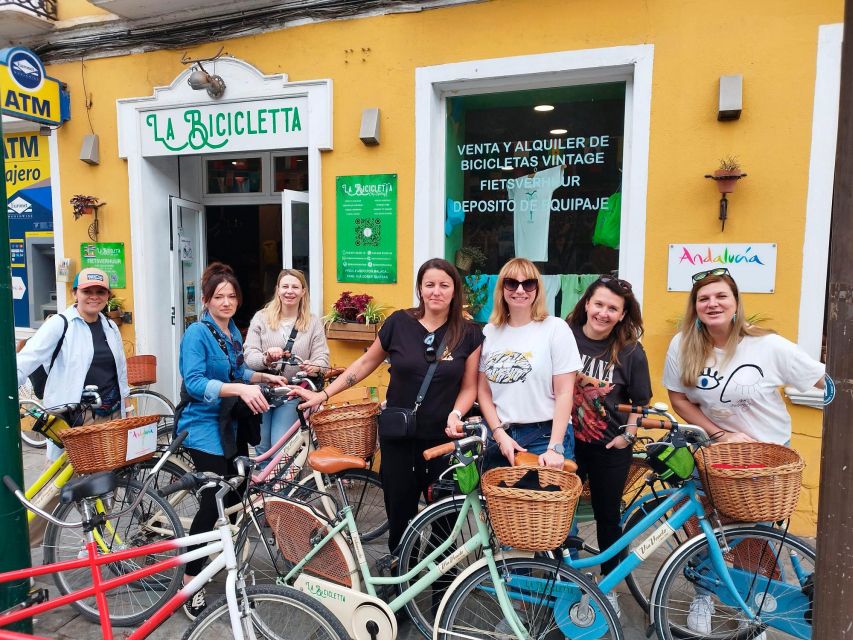 Malaga: Guided Bike Tour - Calle Larios: pedestrian street energy without the car noise