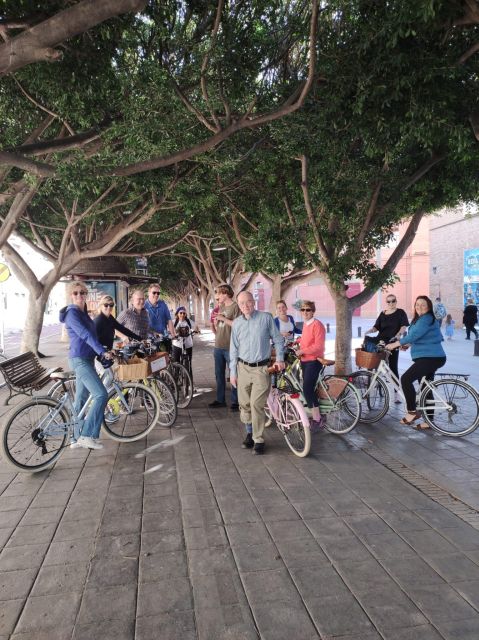 Malaga: Guided Bike Tour - Playa de La Malagueta: beach riding, snack shopping, and sea air