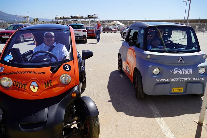 Malaga Highlights by Electric Car with Port Pick up - The Pompidou Malaga color cube and the shopping finish