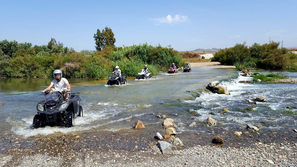 Malaga: Land and River Guided Quad Tour 1-Hour (2-Persons) - Terrain variety you’ll feel immediately: dunes, dirt, asphalt, and climbs