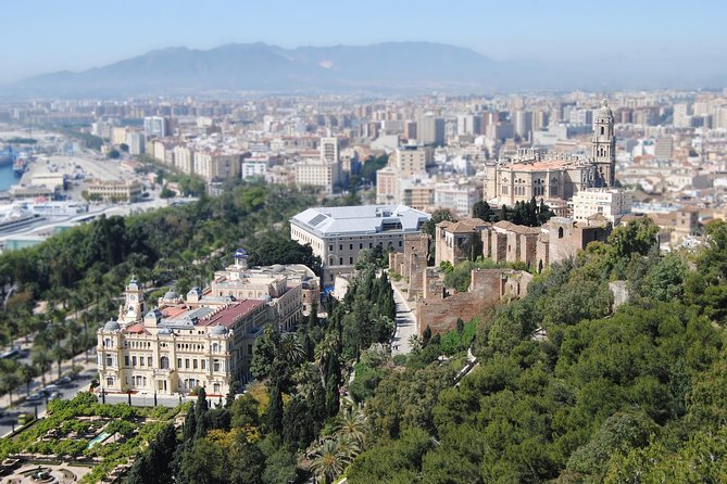 Malaga Monuments Private Walking Tour - Stop One: Plaza de la Marina and the Sea Wall Story