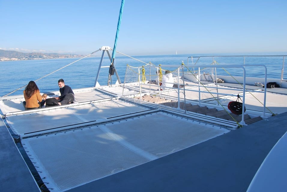 Malaga: Sailing Catamaran Sunset Cruise with Live DJ & Drink - Crew, onboard vibe, and who this suits best