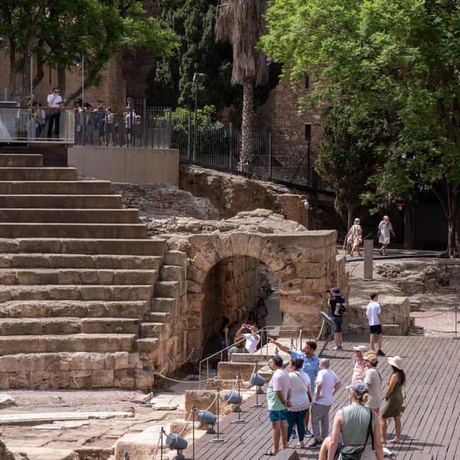 Malaga Walking Tour, Roman Theater and Alcazaba in small group with Tickets - The small details that make the guide experience work