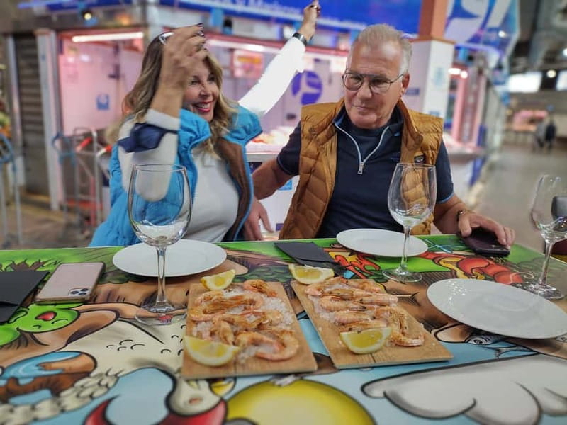 Marbella: Guided Market Tour with Tapas and Wine Pairings - The food lineup: bocata, ham, cheeses, and seafood that’s cooked on the spot