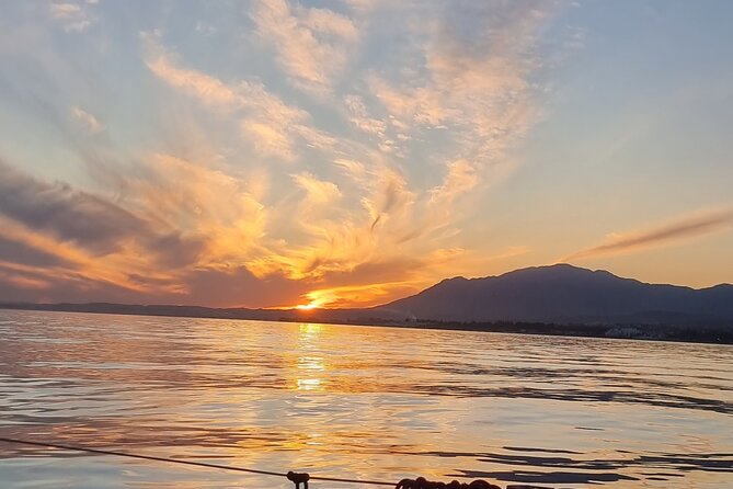 Marbella- sunset from a sailboat with drinks - How long is the cruise, and how to plan your day