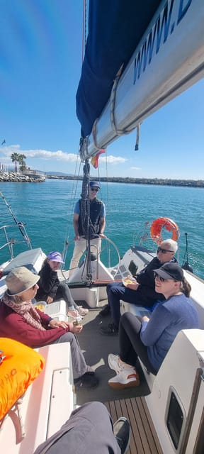 Marbella: sunset sailboat trip Drinks-Snacks,2 hour - On the water: sailing, swimming, paddle fun, fishing, and dolphins