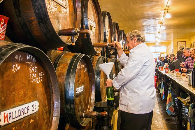 PREMIUM TAPAS TOUR: Paella, Tapas, Winery and Flamenco - Plaza del Siglo: fish specialties and a cooking show moment