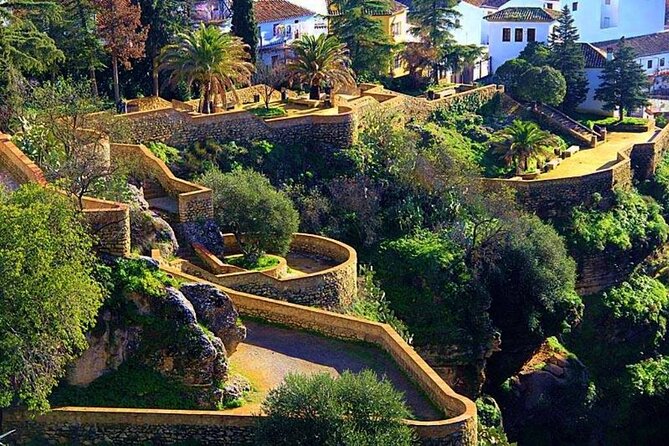 Ronda Historical Walking Tour with Bullring Entrance - Duquesa de Parcent Square and Giant Square: Stories in Leafy Spaces