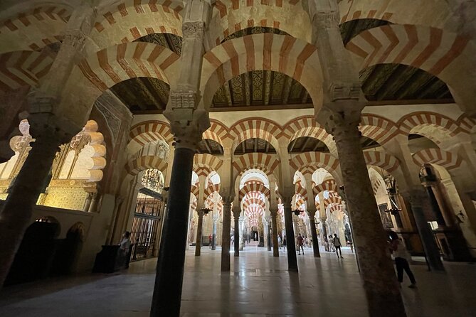 Semi Private Tour to Córdoba from Nerja - Los Patios de San Basilio: Where Flowers Turn a Quarter Into a Show
