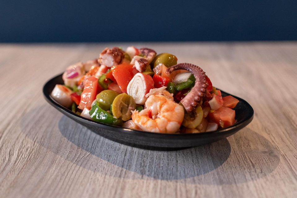 Tapas Tour Paella and Malaga market with Official Guide - Guides make or break food tours: what the tour does well