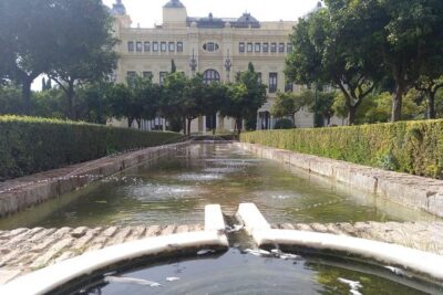 Walk through the old Malaga medina - Constitution Square: The Muslim-era Civic Center Lens